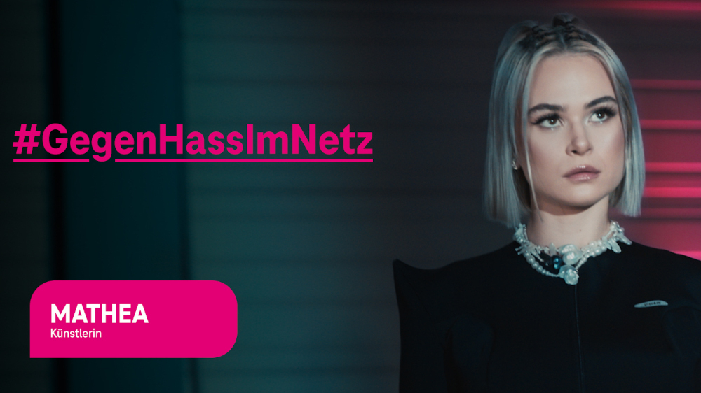 Young woman and next to her a slogan that says "Gegen Hass im Netz"